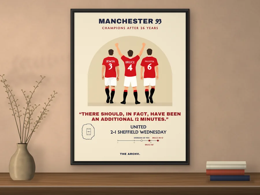 Framed poster of Manchester United 2-1 Sheffield Wednesday at Old Trafford, April 1993, hanging on a wall.